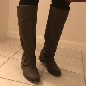 Tall brown riding boots